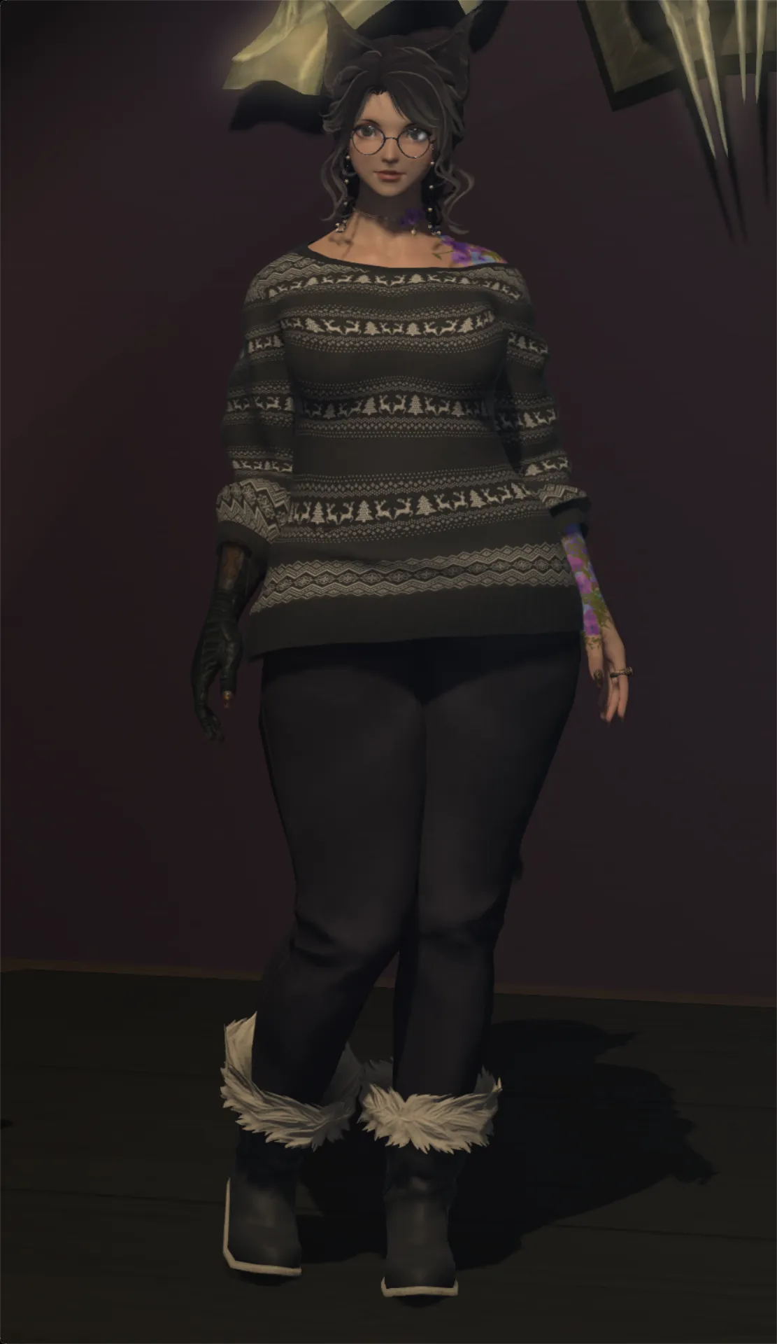 Lazne in a cozy gray fair isle sweater with a tree pattern, dark pants, and fuzzy boots. She has her new reading glasses with a pearl chain on.
